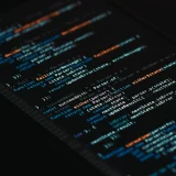 A detailed view of computer programming code on a screen, showcasing software development.