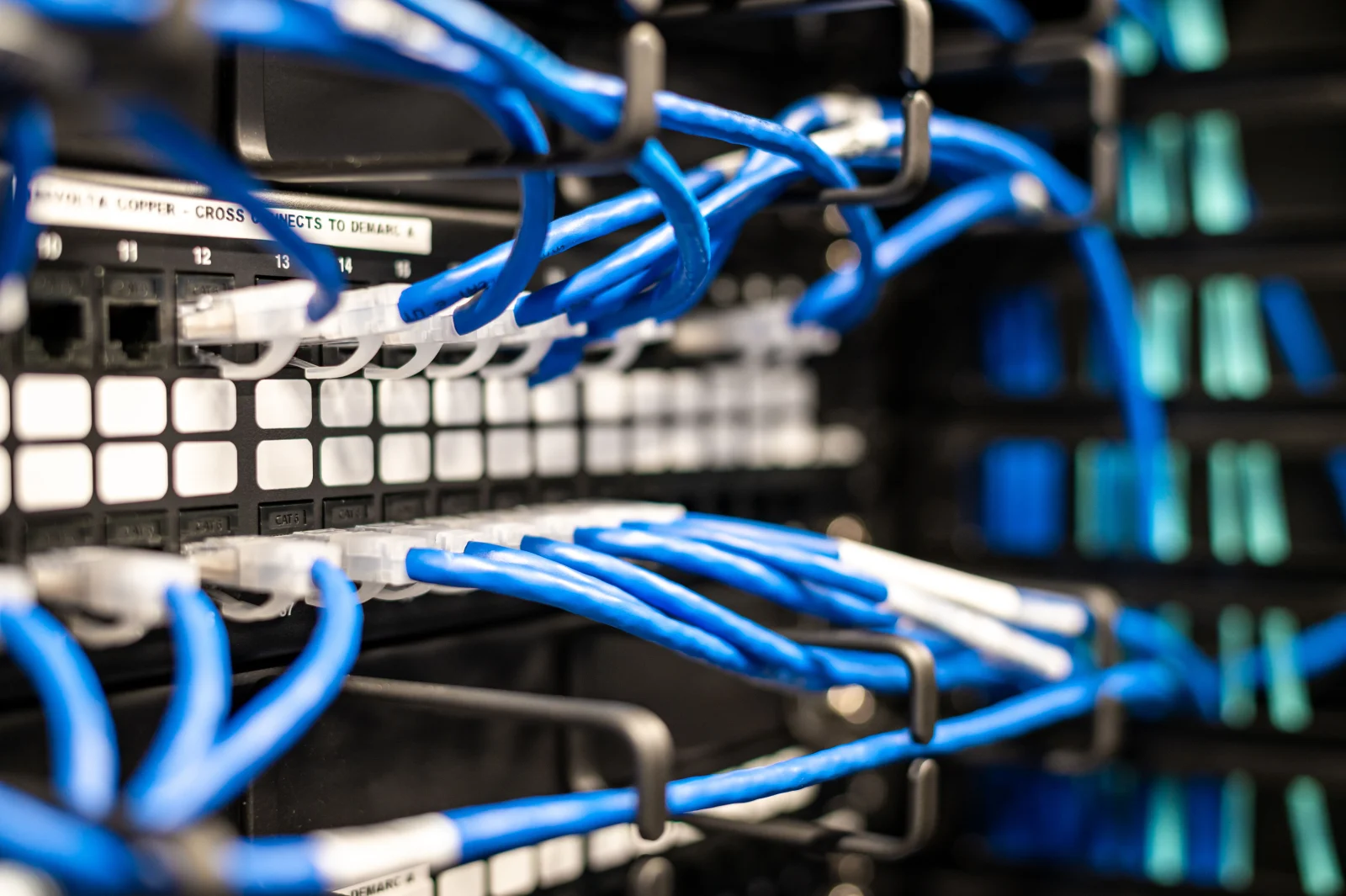 Blue plastic wires with white tips connected to server and provide access to information Blue plastic wires with white tips connected to server and provide access to information